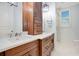 Spa-like bathroom with double vanity and a frameless shower at 4118 Isle Vista Ave, Belle Isle, FL 32812