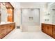 Elegant bathroom with a large walk-in shower and double vanity at 4118 Isle Vista Ave, Belle Isle, FL 32812