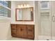 Spa-like bathroom with a walk-in shower and modern vanity at 4118 Isle Vista Ave, Belle Isle, FL 32812