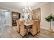 Formal dining room with wood table and rattan chairs at 4118 Isle Vista Ave, Belle Isle, FL 32812