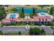 Aerial view of community pool, clubhouse and parking at 197 Valencia Ridge Dr, Auburndale, FL 33823