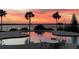 Relaxing community pool area with sunset views and seating at 197 Valencia Ridge Dr, Auburndale, FL 33823