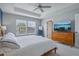 Bright bedroom with king-size bed and large windows at 2923 Ridley Ave, Orlando, FL 32814