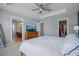 King-size bed in a bedroom with access to bathroom and closet at 2923 Ridley Ave, Orlando, FL 32814