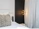 Cozy bedroom with a plush throw and accent pillows at 4458 Kaipo Rd, Davenport, FL 33897