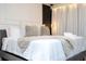 Bright bedroom with plush bedding and modern decor at 4458 Kaipo Rd, Davenport, FL 33897