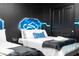 Two twin beds with a futuristic theme and LED accents at 4458 Kaipo Rd, Davenport, FL 33897