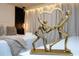 Gold heart-shaped sculpture on a white table at 4458 Kaipo Rd, Davenport, FL 33897