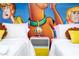 Nightstand between two twin beds with Scooby-Doo decor at 4458 Kaipo Rd, Davenport, FL 33897