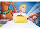 Twin-size bed with Scooby-Doo themed wall art at 4458 Kaipo Rd, Davenport, FL 33897