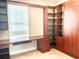 Built-in home office with custom wood shelving and desk at 2475 Hastings Blvd, Clermont, FL 34711