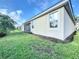 Well-maintained exterior with manicured lawn and landscaping at 1065 Blackwolf Run Rd, Davenport, FL 33896