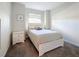 Cozy bedroom with window and neutral-toned furnishings at 1065 Blackwolf Run Rd, Davenport, FL 33896