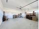 Spacious garage with ample storage space and interior access at 1065 Blackwolf Run Rd, Davenport, FL 33896