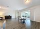 Living room with sliding glass doors leading to a screened lanai at 1065 Blackwolf Run Rd, Davenport, FL 33896