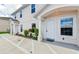 Two story building exterior with front entrance and landscaping at 210 Majors Ln # B, Kissimmee, FL 34743