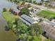 Aerial perspective of two townhouses by a lake at 210 Majors Ln # B, Kissimmee, FL 34743