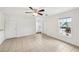 Living room featuring tile floors, a ceiling fan, and an open layout at 210 Majors Ln # B, Kissimmee, FL 34743