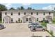 Three-unit building with parking and lake view at 210 Majors Ln # B, Kissimmee, FL 34743