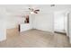 Open concept living room and kitchen with tile floors at 210 Majors Ln # B, Kissimmee, FL 34743