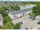 Aerial view of three-unit building near lake at 210 Majors Ln # B, Kissimmee, FL 34743