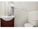 Small half bathroom with toilet and pedestal sink at 210 Majors Ln # B, Kissimmee, FL 34743