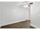 Bright bedroom with ceiling fan and carpet at 1700 Minnesota Ave, St Cloud, FL 34769