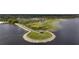 Aerial view of a lakeside park with gazebo and walking path at 1700 Minnesota Ave, St Cloud, FL 34769