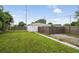 Large backyard with detached workshop at 1700 Minnesota Ave, St Cloud, FL 34769
