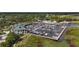 Aerial view of a marina with numerous boats and a clubhouse at 1700 Minnesota Ave, St Cloud, FL 34769
