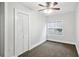 Simple bedroom with closet and carpet at 1700 Minnesota Ave, St Cloud, FL 34769