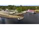 Aerial view of a boat ramp with paddleboat and parking at 1700 Minnesota Ave, St Cloud, FL 34769