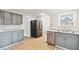 Updated kitchen with stainless steel appliances and ample cabinet space at 1700 Minnesota Ave, St Cloud, FL 34769
