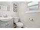 Clean and updated bathroom with a single vanity at 1700 Minnesota Ave, St Cloud, FL 34769