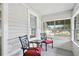 Cozy front porch with seating, perfect for relaxing at 1700 Minnesota Ave, St Cloud, FL 34769
