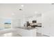 Modern kitchen with stainless steel appliances and an island at 523 Kennedy Dr, Lake Alfred, FL 33850
