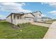 Single-Gathering home with landscaping and a brick driveway at 523 Kennedy Dr, Lake Alfred, FL 33850