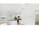 Modern kitchen with stainless steel appliances and an island at 523 Kennedy Dr, Lake Alfred, FL 33850