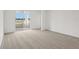 Bedroom with sliding glass doors to patio at 523 Kennedy Dr, Lake Alfred, FL 33850