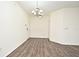Bright dining room featuring wood-look flooring at 5467 Vineland Rd # 6308, Orlando, FL 32811