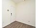 Clean entryway with wood-look flooring at 5467 Vineland Rd # 6308, Orlando, FL 32811