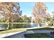 Peaceful pond with fountain and walkway at 5467 Vineland Rd # 6308, Orlando, FL 32811