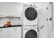 Stackable washer and dryer in a convenient laundry room at 241 Riverside Dr # 1901, Daytona Beach, FL 32117