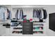 Large walk-in closet with ample shelving and hanging space at 241 Riverside Dr # 1901, Daytona Beach, FL 32117