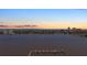 Aerial view of the property and waterfront at sunset at 241 Riverside Dr # 1901, Daytona Beach, FL 32117