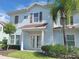 Light blue two story building with brown trim at 8959 Shine Dr, Kissimmee, FL 34747