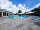 Inviting community pool with lounge chairs and shaded areas at 8959 Shine Dr, Kissimmee, FL 34747