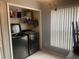 Convenient laundry closet with washer, dryer, and storage at 4336 Cypress Bay Ct, Orlando, FL 32822