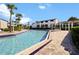 Relaxing community pool with surrounding patio at 4267 S Semoran Blvd # 19, Orlando, FL 32822