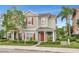 Two-story townhome with red shutters and a front porch at 1383 Alston Bay Blvd, Apopka, FL 32703